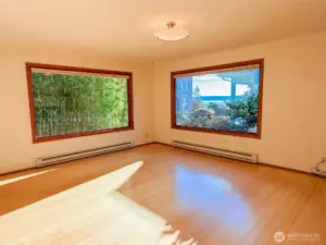 Bamboo Floors throughout Main Living area.  Fabulous Windows for that Natural Light.  Arresting Water and Mountain View from this room.
