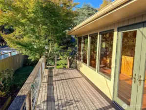 Another view of the Sunroom Deck with access to the Backyard.