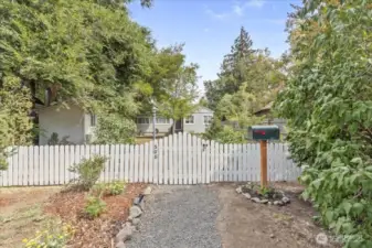 Cozy 1940s Charm in the Heart of Downtown  This well-loved home blends timeless character with thoughtful updates. Fresh paint throughout, new carpet, updated doors, and charming built-ins make it move-in ready. Bright, sun-filled rooms create a warm and welcoming feel the moment you step inside.