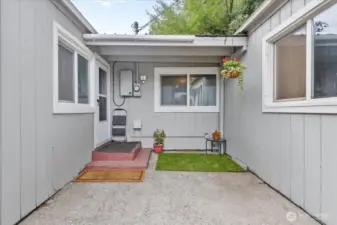 Low maintenance back entrance with easy access to dining and kitchen area.