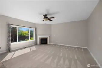 The main floor showcases new carpet in a thoughfully maintained one-owner home awaiting its new owners.