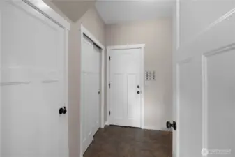Functional utility room offers pantry and closet storage, cabinets, and counter space, add your washer and dryer.