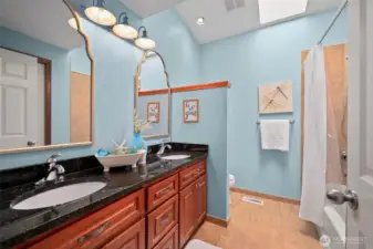 Enjoy the airy feel of this primary bath, enhanced by beautiful skylights