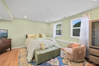 Versatile lower level perfect for guest  quarters, MIL suite, or extended family with private entrance and living space