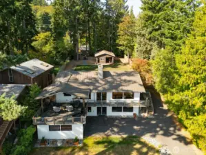 Fantastic drone shot of this wonderful home and property with new shop in back. Fenced back yard .