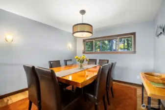 Cozy formal dining area .