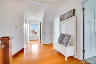 The gleaming fir floors were refinished within the last five years, adding to their charm. The built-in drawers are a classic feature that reflects the home’s era. Now, let’s take a look at the primary bedroom!
