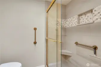 3/4 en-suite bathroom off primary with heated floors and walk in closet