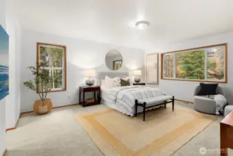 Primary bedroom filled with light!