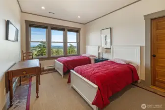 Lower-level bedroom, with natural light, and peaceful views—ideal for guests or flexible living.