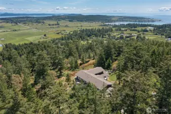 Custom-built Craftsman estate with generous proportions and flexible living spaces, ideal for full-time living or a San Juan Island getaway.