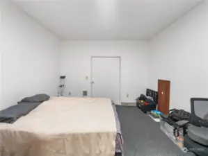This room is being used as a bedroom but has no closet