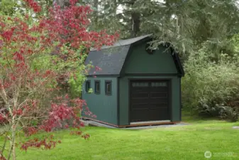 Garden/lawn mower shed.