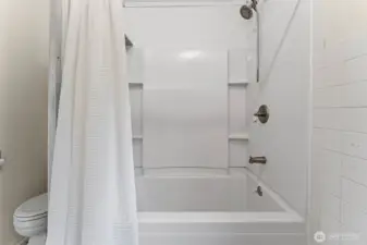 Bathroom with shower and tub