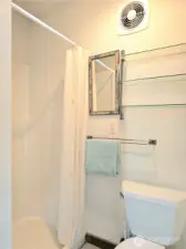 1/2 bath is studio with on demand hot water.