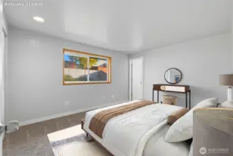 Virtually staged primary suite.