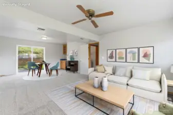 Virtually staged downstairs rec room.