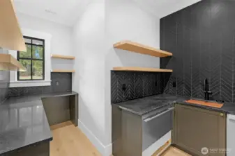 Butler Pantry for prep and storage. Fischer Paykel beverage fridge, 2nd dishwasher and it's designed for a Kegerator :)