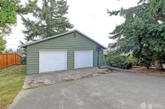 HUGE is the detached 2 car garage w/shop/studiio-flex space attached. Toys, shop....yoga....bunk room??? Lot's of great options to choose from.  HUGE almost 22,000 sq ft lot!