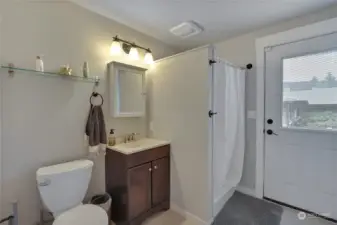 Main floor bath that leads to outside