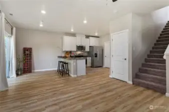 Stairs to the right lead to the 3 bedrooms, full common bath & the utility room on the 2nd level.