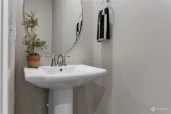 Powder room (.5 bath) downstairs.