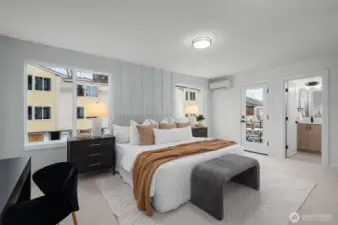 Your dreamy retreat awaits. The luxe primary suite offers serene vibes and natural light from every angle—plus a peek into your spa-like bath and private balcony!