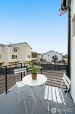 Morning matcha or evening wine? This private balcony off the primary suite is ready for both.
