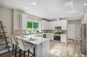The dining room over looks the chief's kitchen so you don't miss out on all the fun.