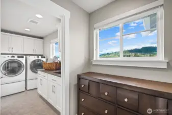 The laundry room sits off the primary bedroom.
