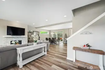 Welcoming front entry with an abundance of natural light. Imagine the breeze from a cool summer day flowing from door to door through your open floor plan.