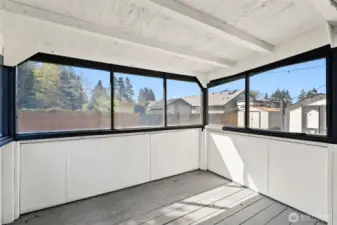 Completely covered back porch - practical place for sipping morning coffee in the PNW