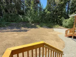Both the main home and ADU have entrances at the back via gravel path, and connect directly to your new back yard.