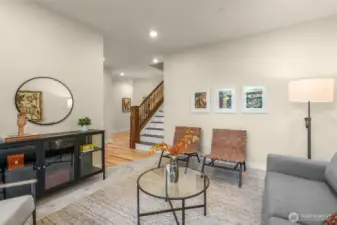 Downstairs family room, perfect for cozy or formal entertaining.