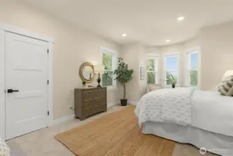 Spacious owner's suite/primary bedroom suite.