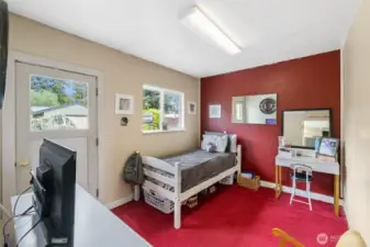 Den- Being used as a bedroom.