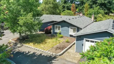 Fantastic home, property, and detached garage on nearly half-acre!  Mature trees line the circle driveway, which offers easy access to every part of the home.