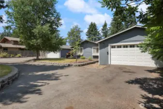 This angle shows the detached garage proximity to home.