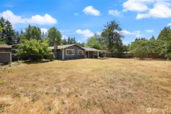 Spacious, level, fully fenced lot has MANY possibilities; hard to find this kind of space and privacy, at this price!