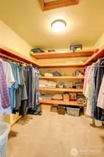 Primary bedroom walk in closet