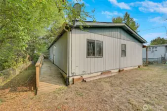 NW corner of house with wrap around deck.