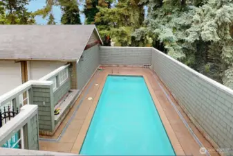 The pool! Looking from the deck off the kitchen/living area
