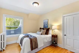 Bedroom #2 with view of the balcony.