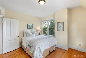 Bedroom #3 with outdoor access to the upstairs balcony.