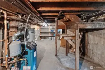 Basement with extra storage area.