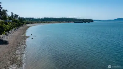 This stretch of waterfront from the property arcs over to the ferry landing. Ferry out to the San Juan islands a quick drive away.