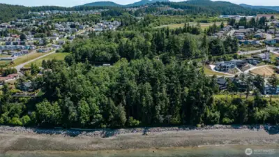 Close up shot of property showing development around the parcel.