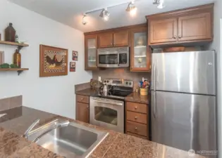 Stainless steel appliances and thoughtfully updated kitchen.