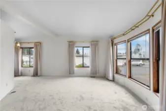 Enter into the light and bright living room. Brand new carpets throughout the home.