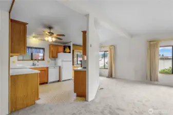 A view of the living room and kitchen areas. A great layout.
